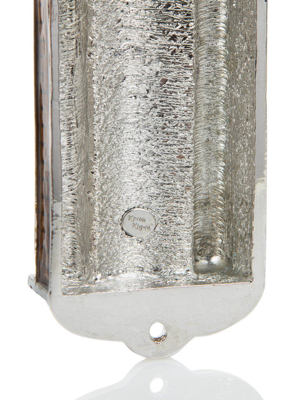 Brown Judaica mezuzah with textured enamel finish on white background