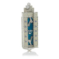 Decorative Mezuzah case with blue cover and silver details on a white background
