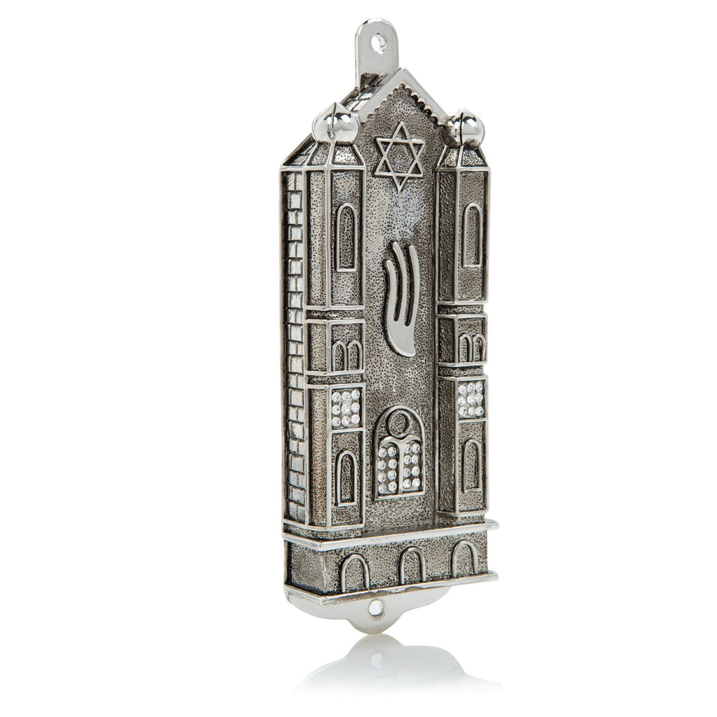 Decorative mezuzah case with Star of David and Hamsa on a white background