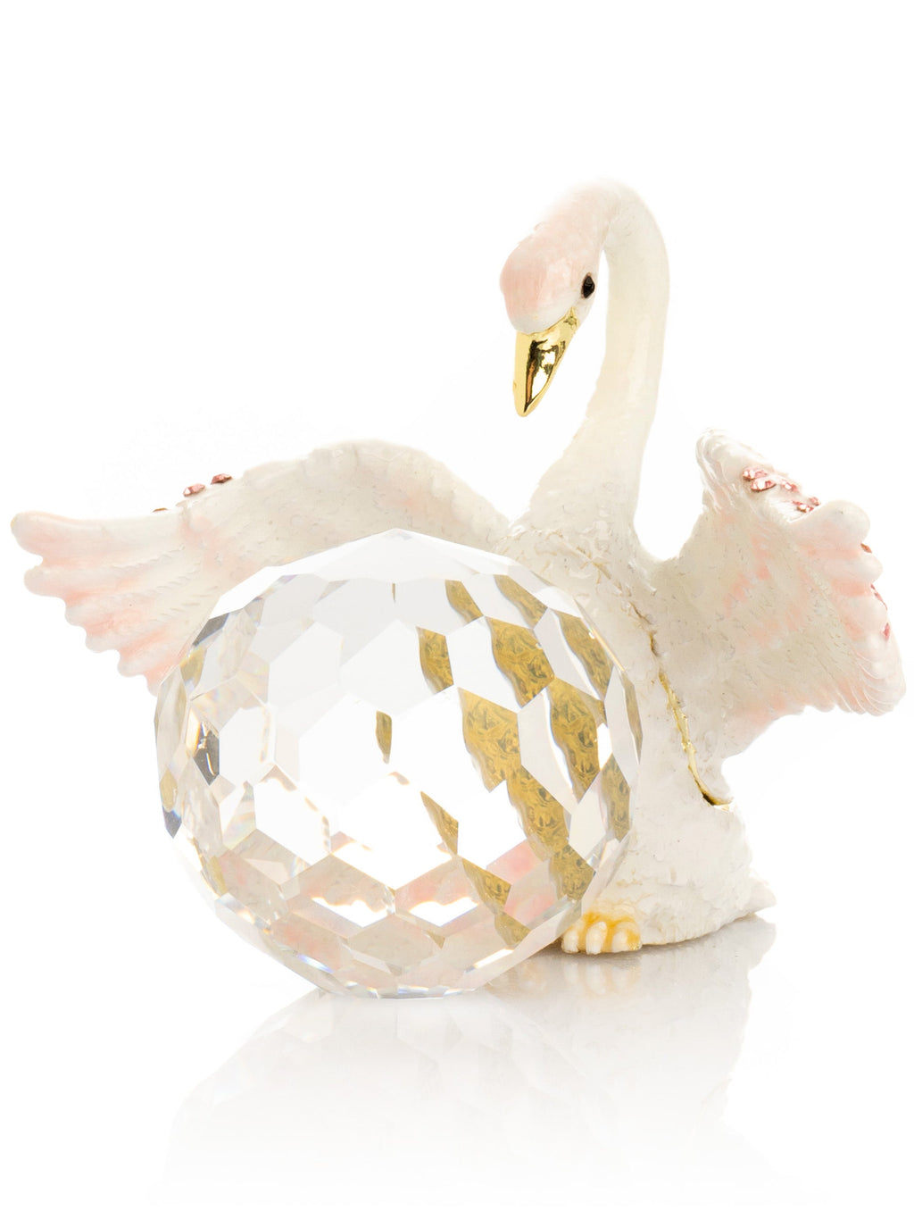 Decorative swan figurine with a crystal ball inside on a white background