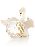 Decorative swan figurine with a crystal ball inside on a white background