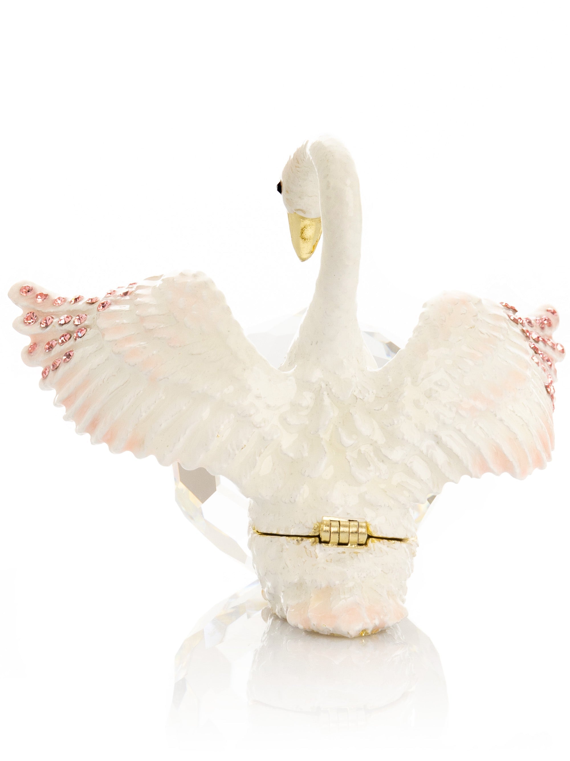 Decorative swan figurine with outstretched wings on a white background
