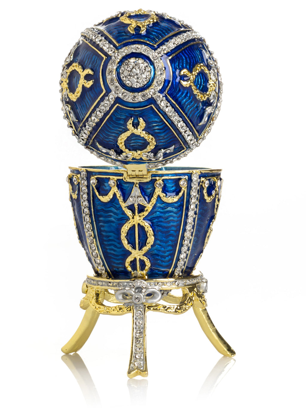 Decorative blue and gold egg with intricate designs on a white background