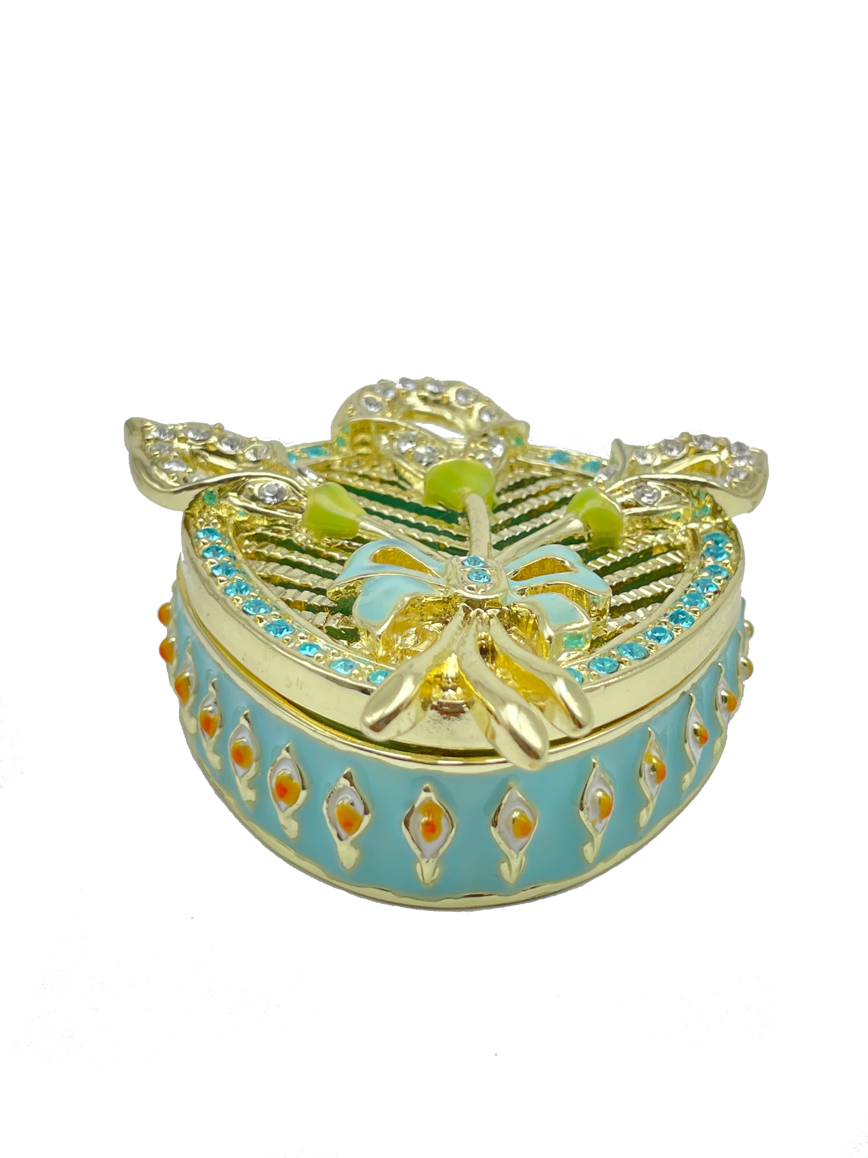 Decorative box with gold and blue design on a white background