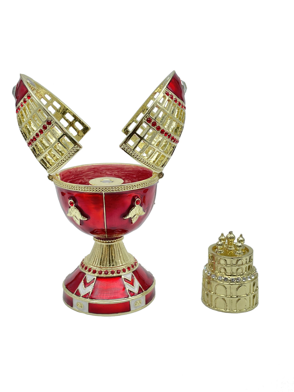 Decorative red and gold cup with intricate designs on a white background