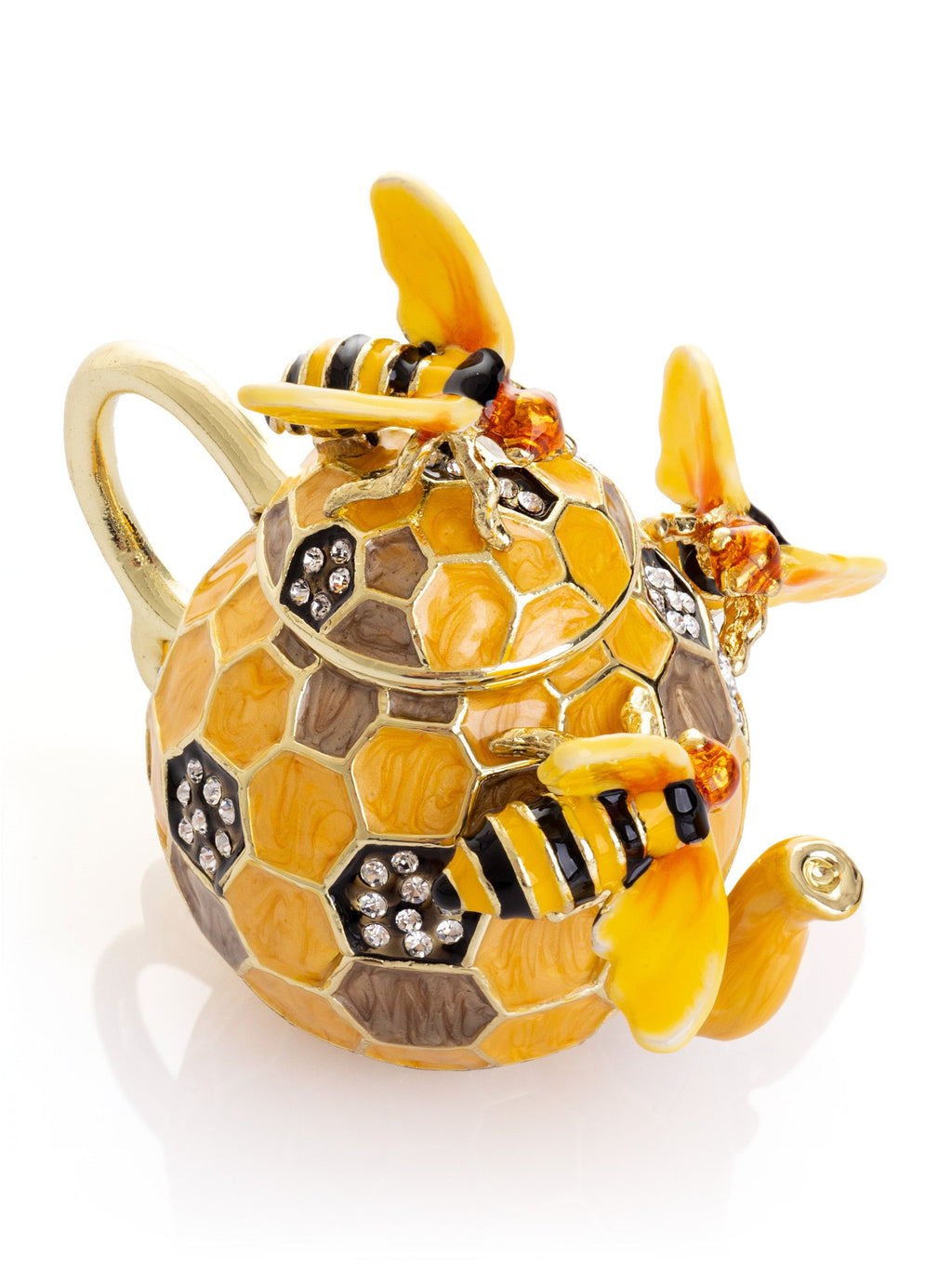 Decorative teapot shaped like a bee with honeycomb design on a white background