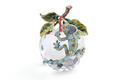 Decorative crystal ball with a Chameleon and leaf design on a white background