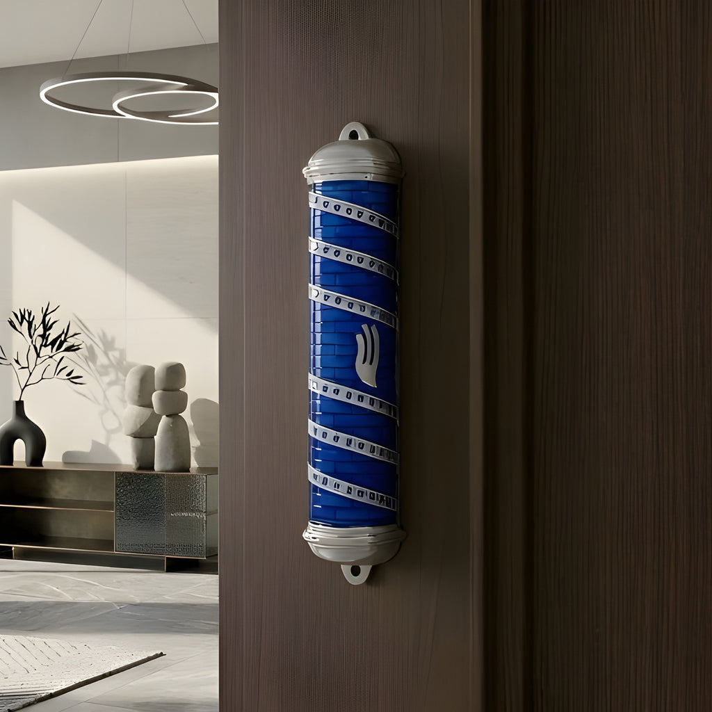 Decorative mezuzah case affixed to doorpost - traditional Jewish symbol of faith and home protection