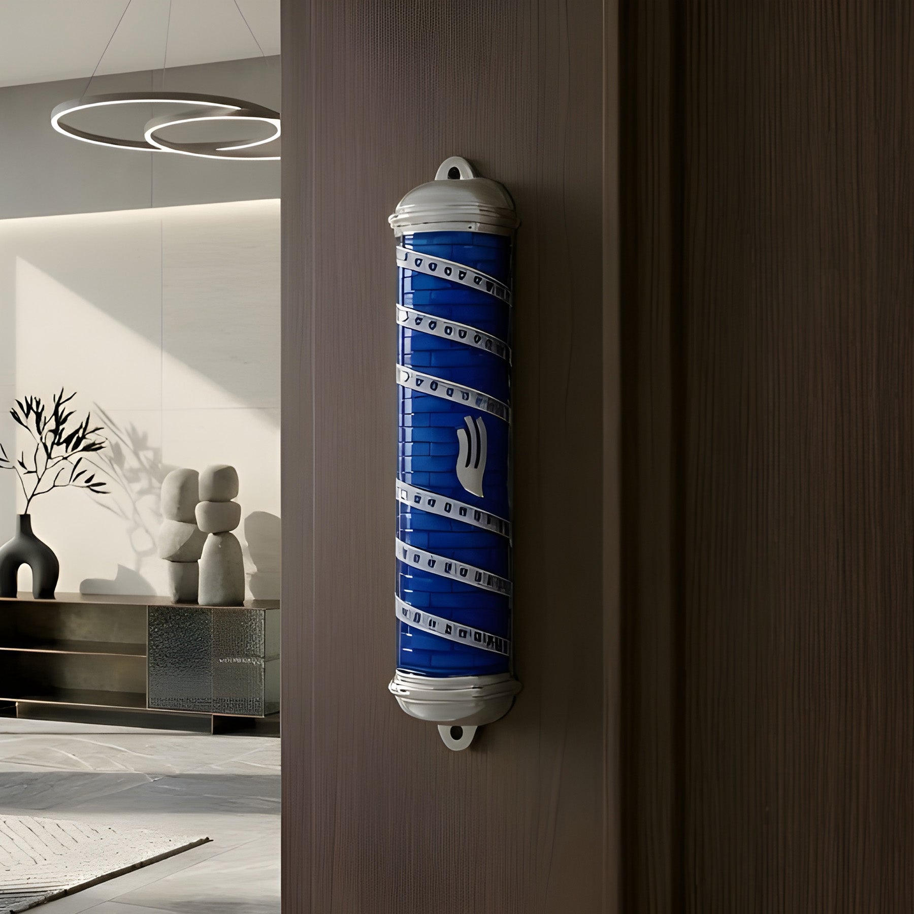 Decorative mezuzah case affixed to doorpost - traditional Jewish symbol of faith and home protection