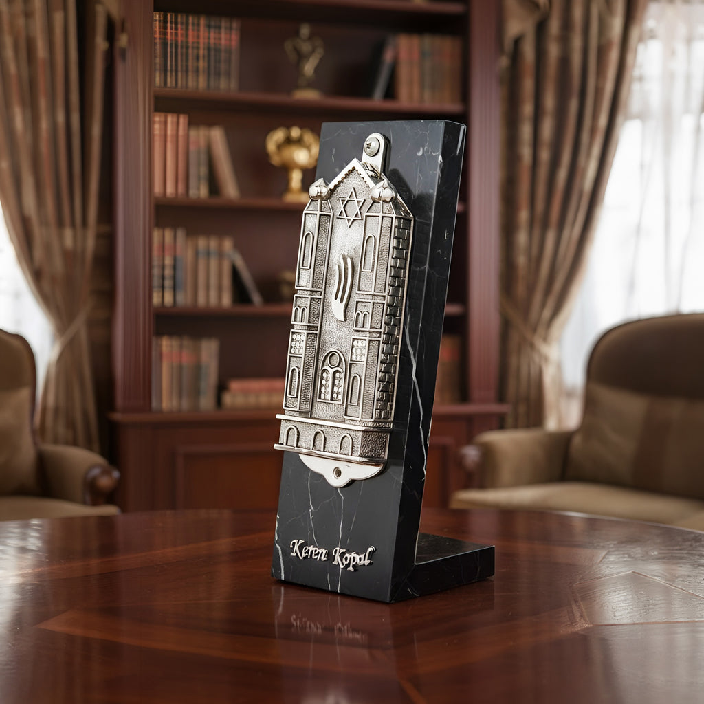 Silver Holy Ark mezuzah with architectural details on white background
